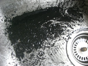 Residue from heating system after cleaning a boiler filter